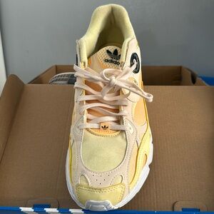 Adidas Women’s Astir 'Almost Yellow Ecru Tint' in size 11